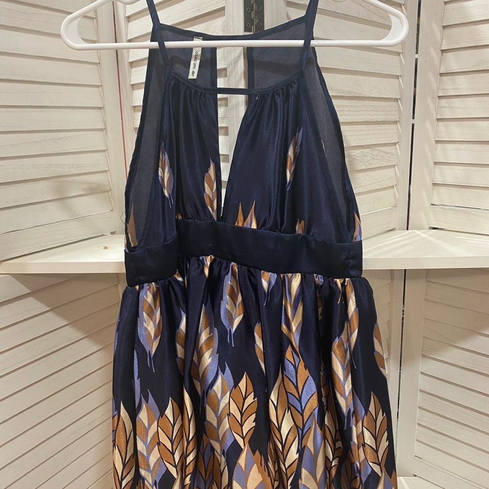 Satin like long shirt with back tie, pretty leaf print